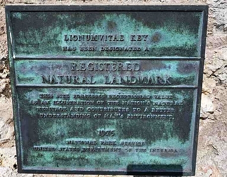 Close-up of a Registered Natural Landmark plaque in the Florida Keys.